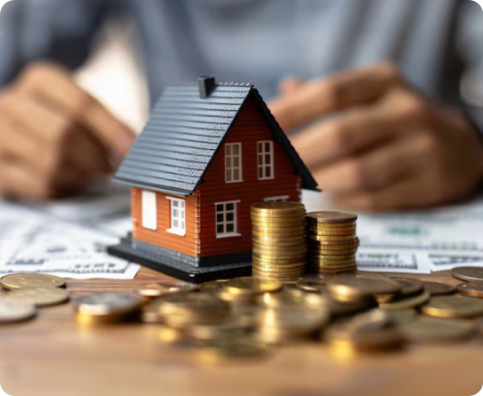 Happy Indian family in front of their dream home